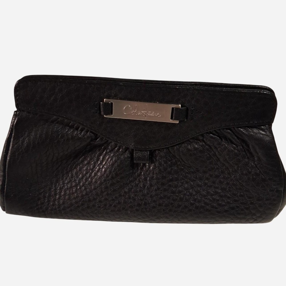 Womens Black leather clutch with textured pebbled finish great for make up